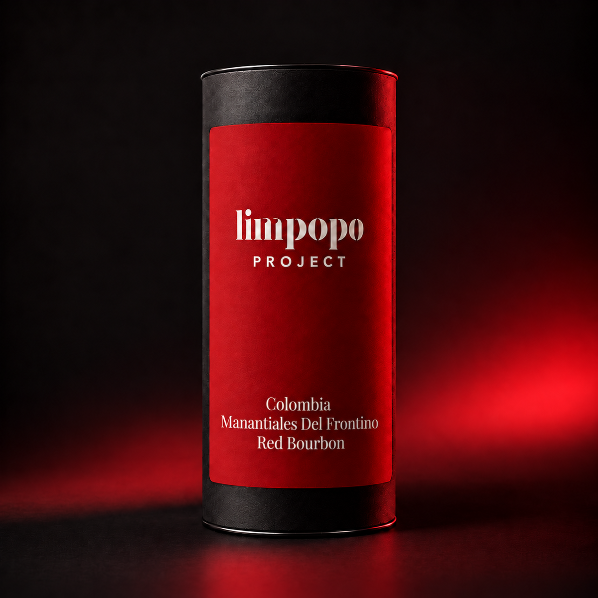 Limpopo Project Colombia Manantiales Del Frontino Red Bourbon coffee in a black cylinder with a deep red label.